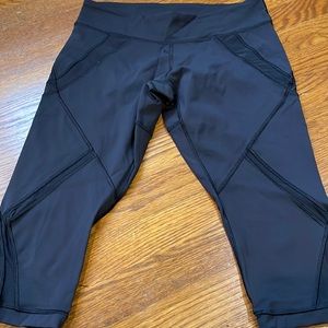 Lululemon black 17” leggings with mesh inserts